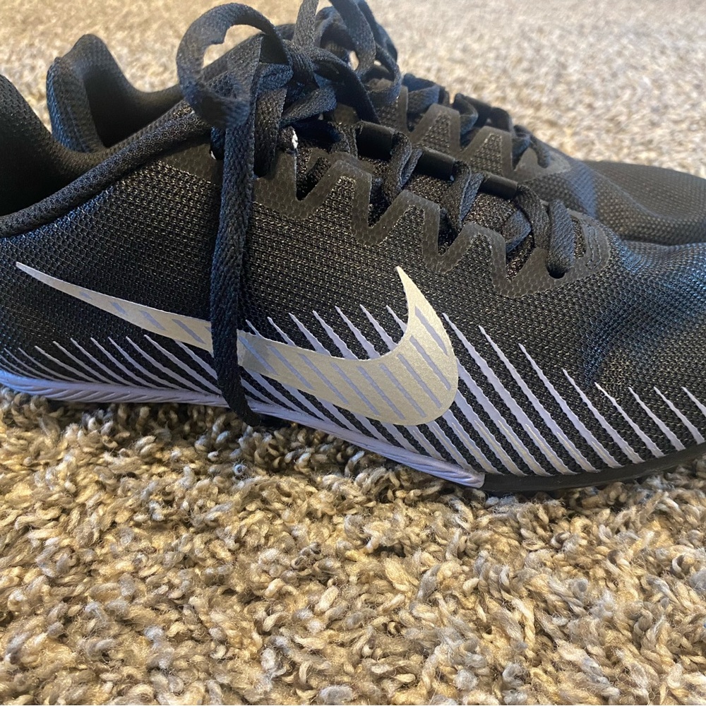 Nike Womens  Black Running Shoes with Silver Swoosh
